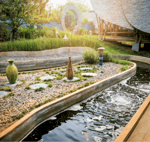 Oval-Shaped backyard Pond ideas