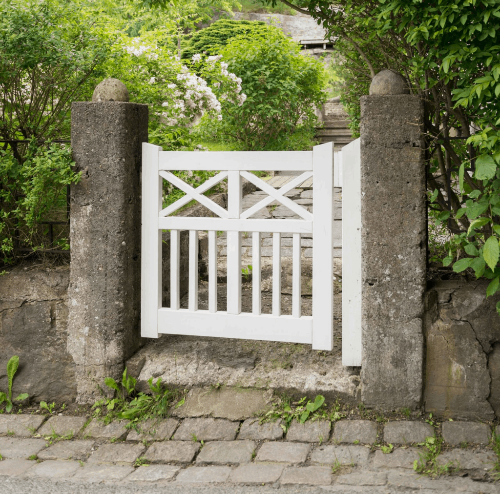 Stone Posts With White Wooden Gate