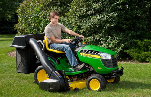 john deere x758 with problems tractor on green lawn